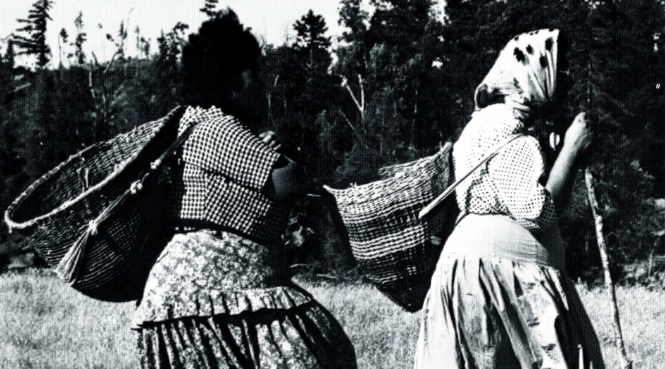 Native American women with baskets